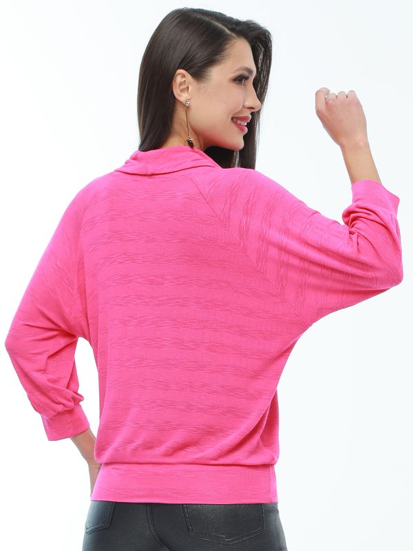 Bat blouse in bright pink.