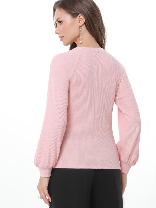 Peach sweater with puffed sleeves