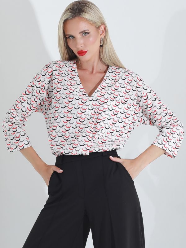 Printed blouse with a flap on the chest